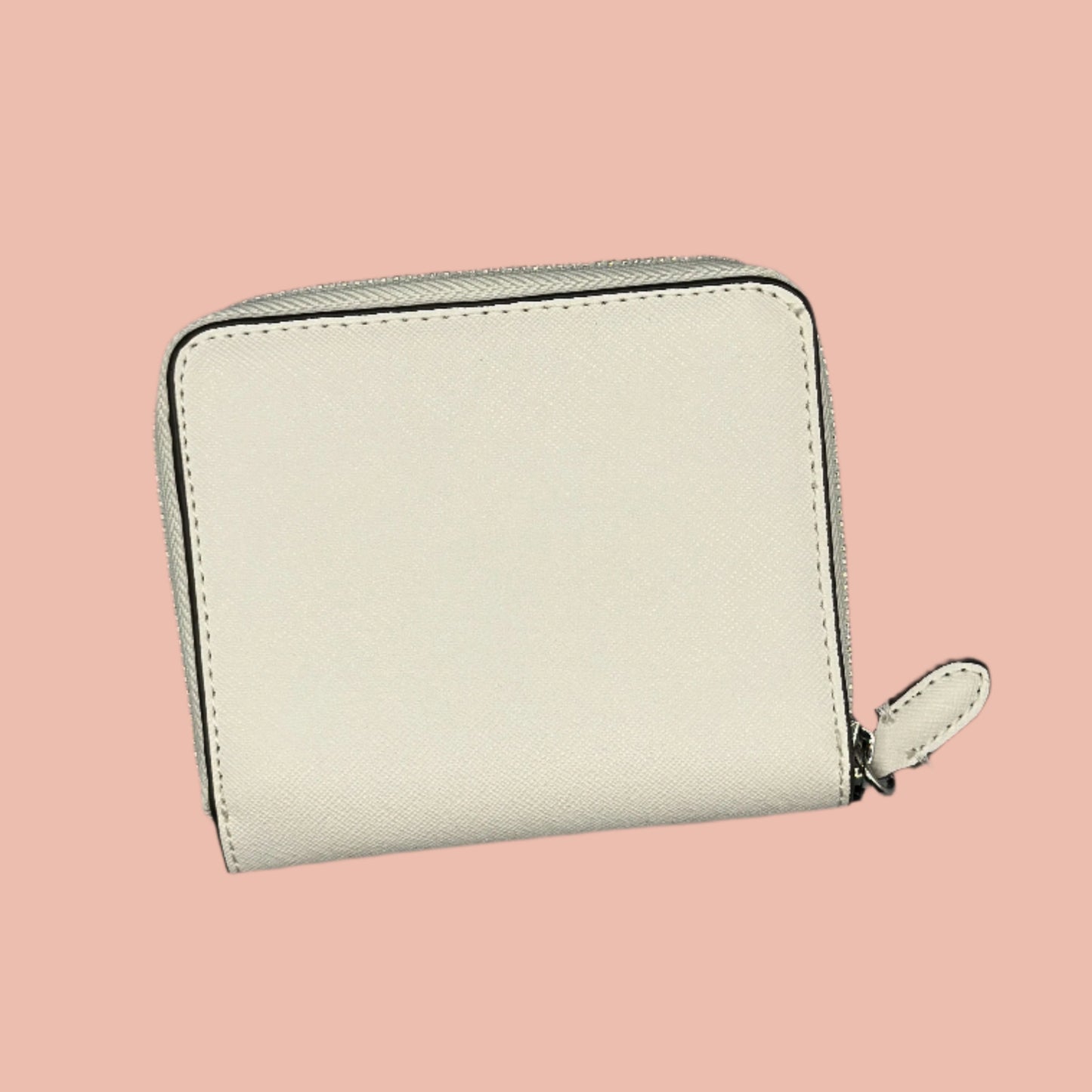 White wallet with a zipper on a gray background dkny woman