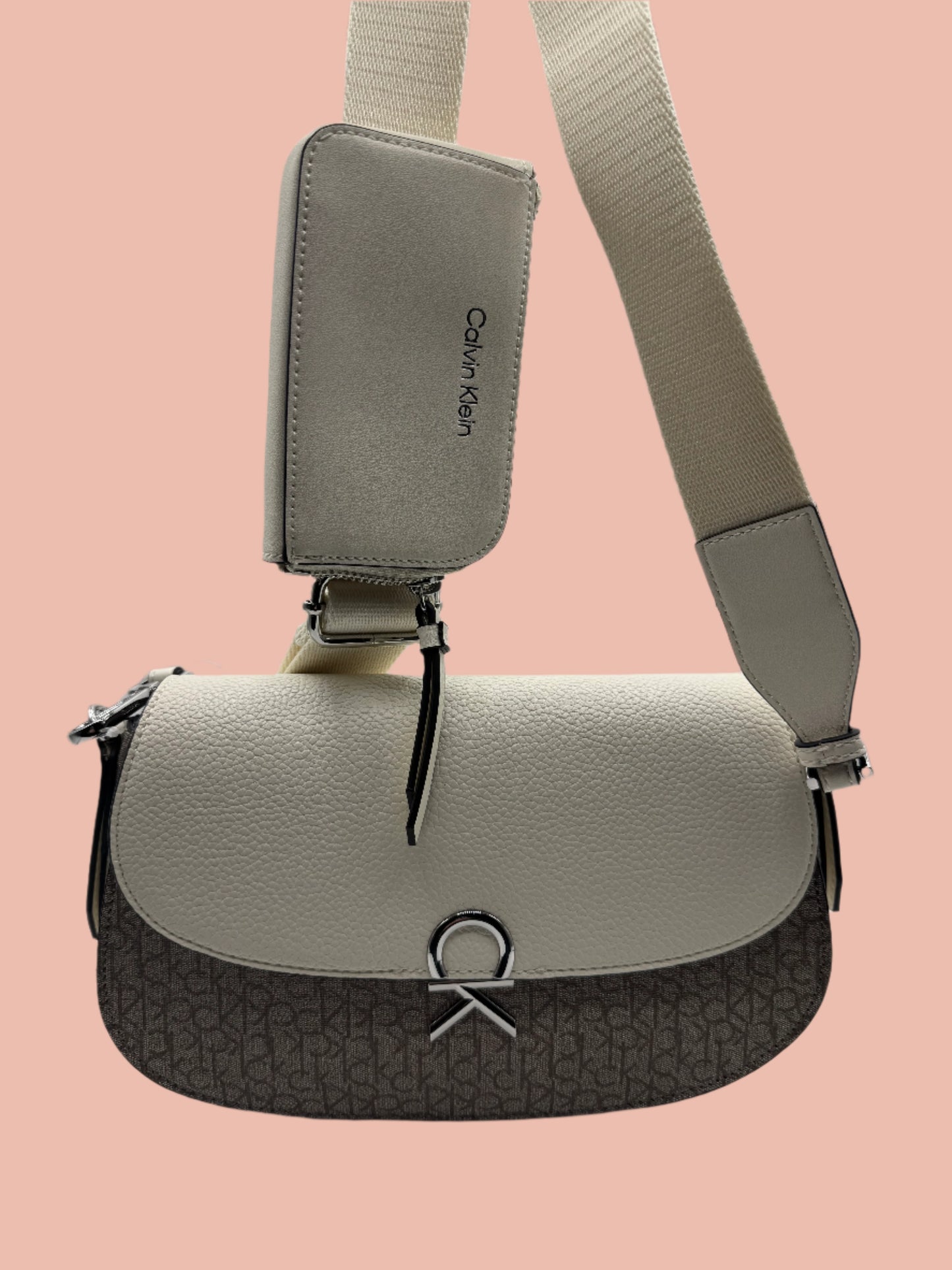 Calvin Klein crossbody features a sleek flap design