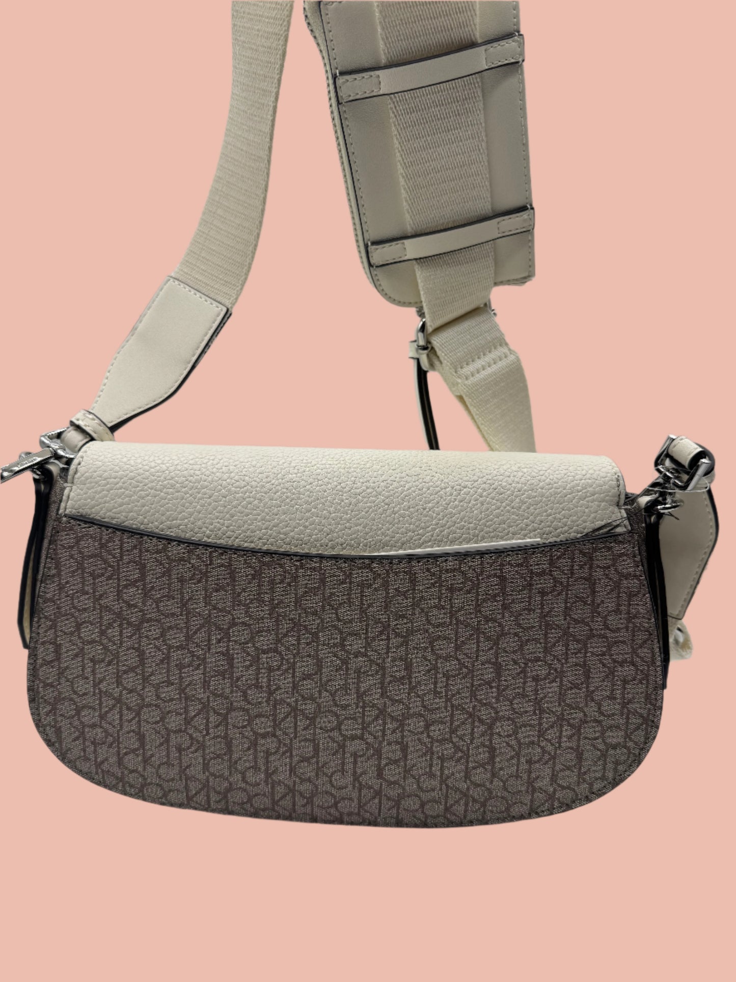 Calvin Klein crossbody features a sleek flap design