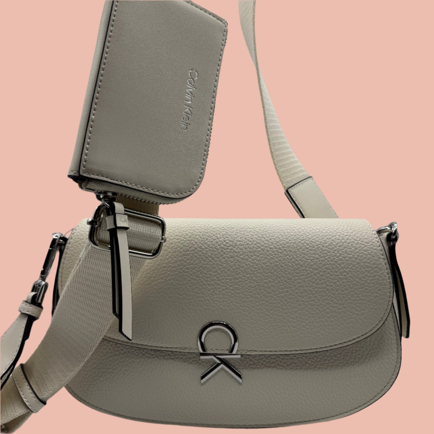 Calvin Klein crossbody features a sleek flap design