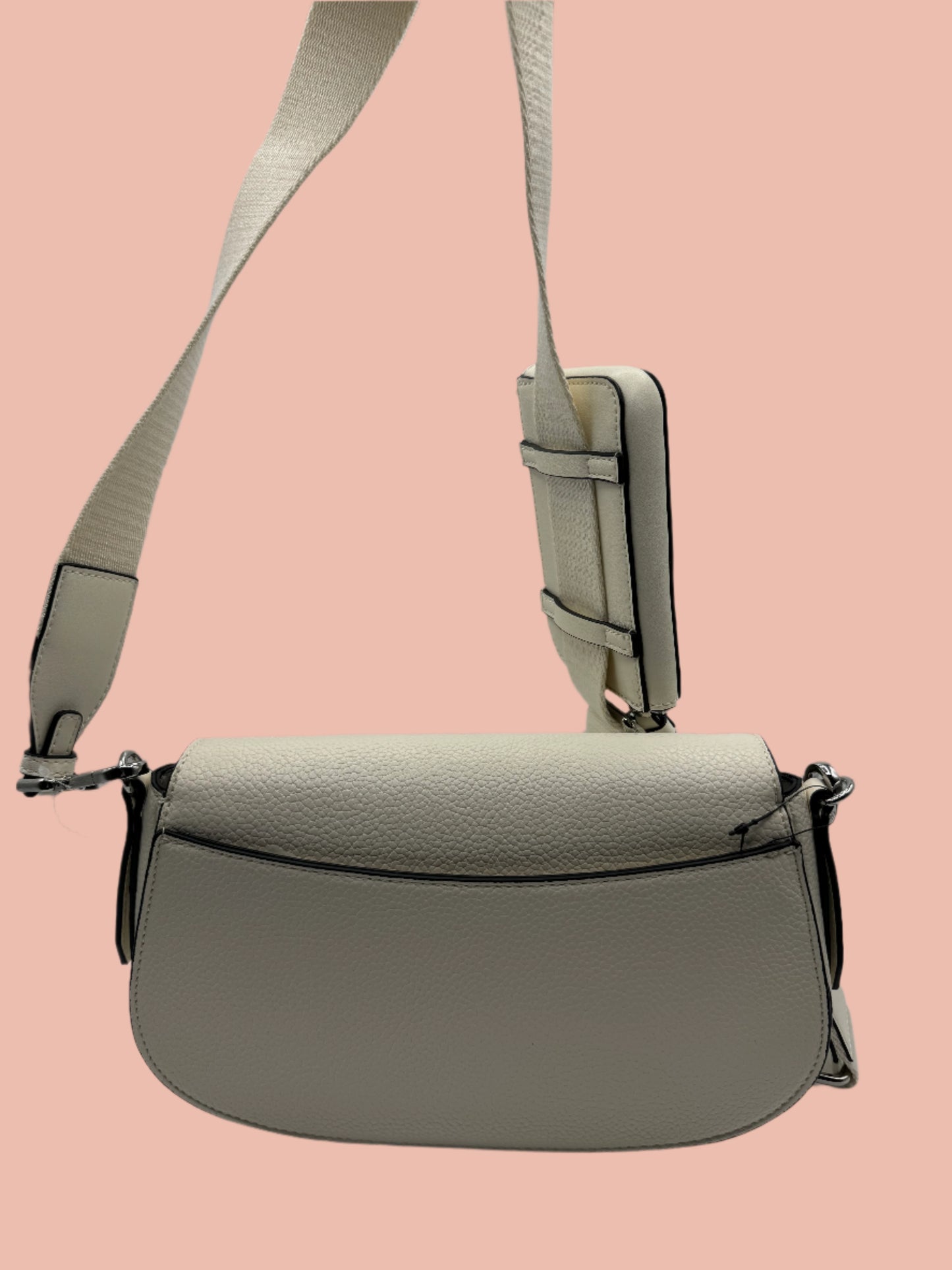 Calvin Klein crossbody features a sleek flap design