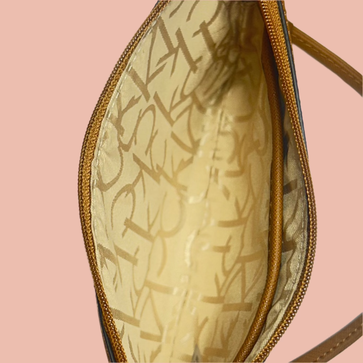 Calvin Klein Wristlet in Brown/Camel