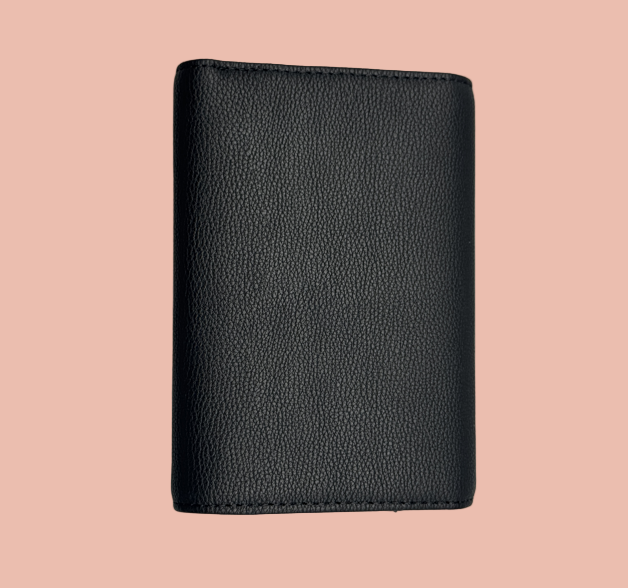 Black leather wallet on a light gray background