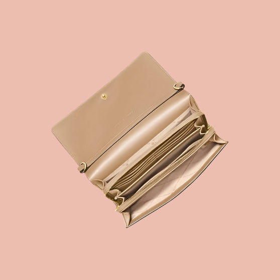 Beige wallet on a white background