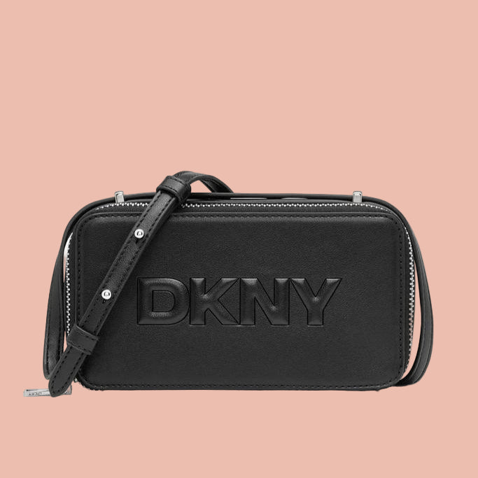 Black DKNY handbag on a white background