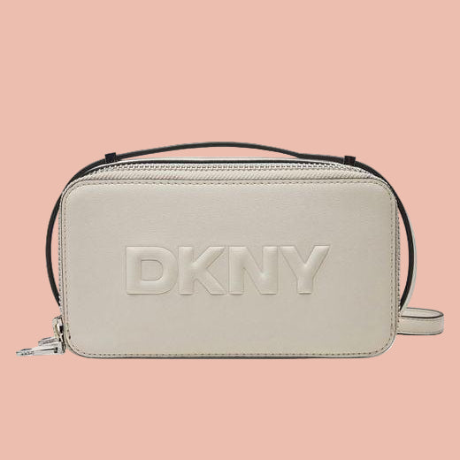 Beige handbag with 'DKNY' logo on a white background