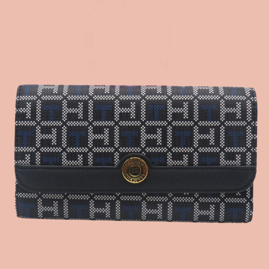 tommy hilfiger Blue and white patterned wallet with gold emblem on a white background