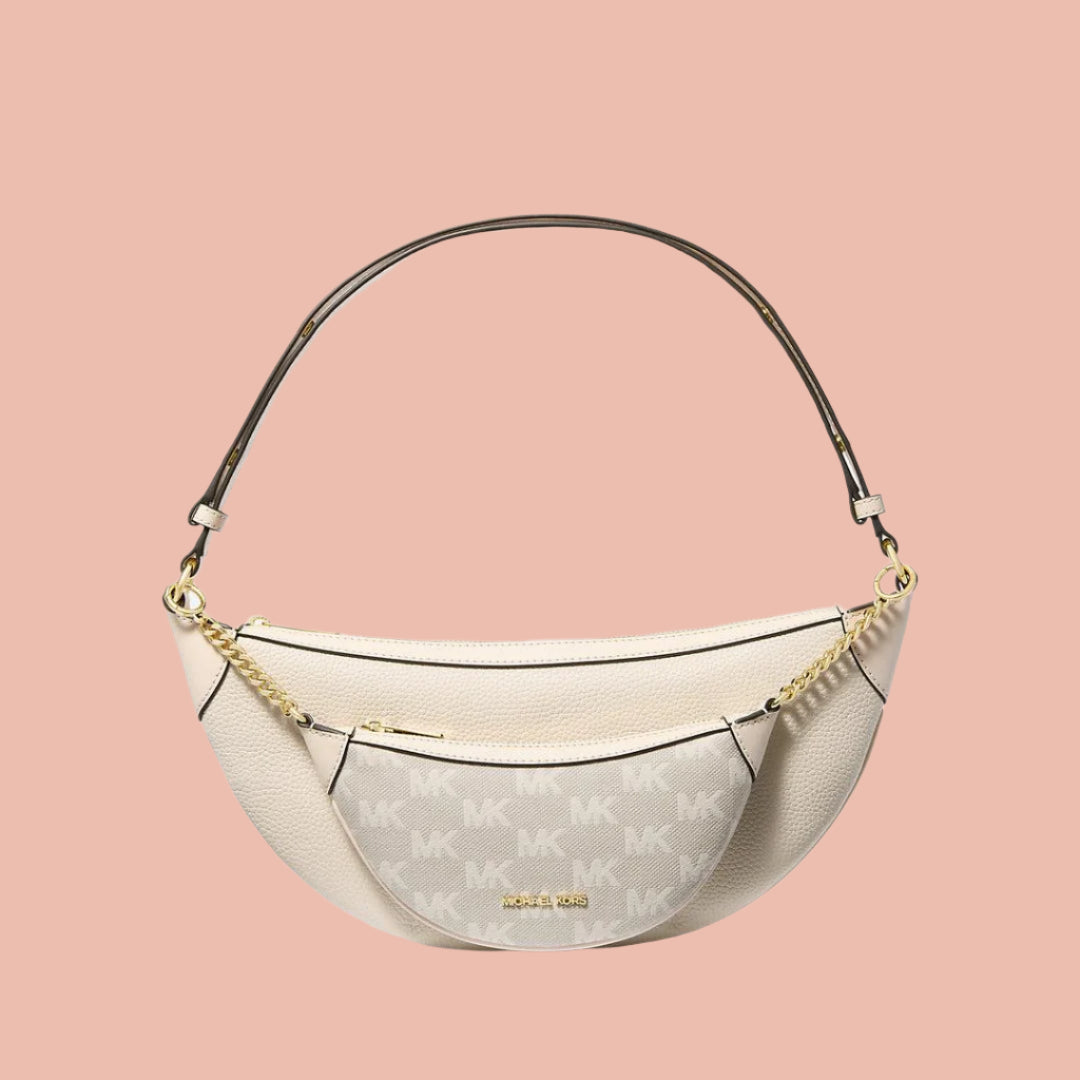 Handbag with gold chain detail on a white background